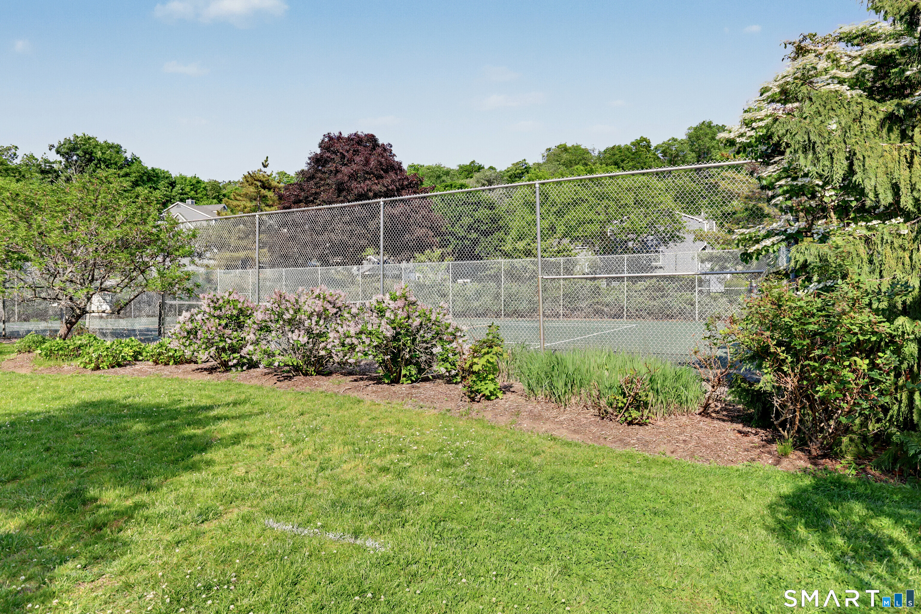 70 Fawn Ridge Lane, Unit 70 Norwalk, CT 06851 - Photo 34 of 36 a view of a garden