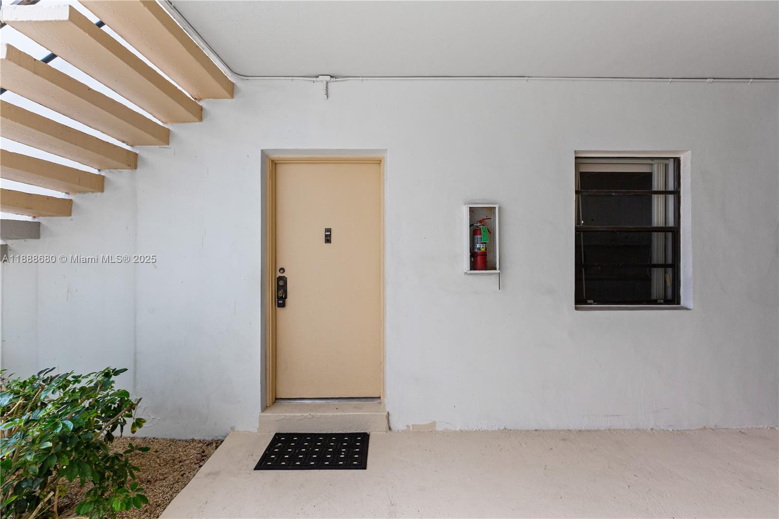 8277 Southwest 128th Street, Unit 108 Pinecrest, FL 33156 - Photo 2 of 34 a view of an empty room