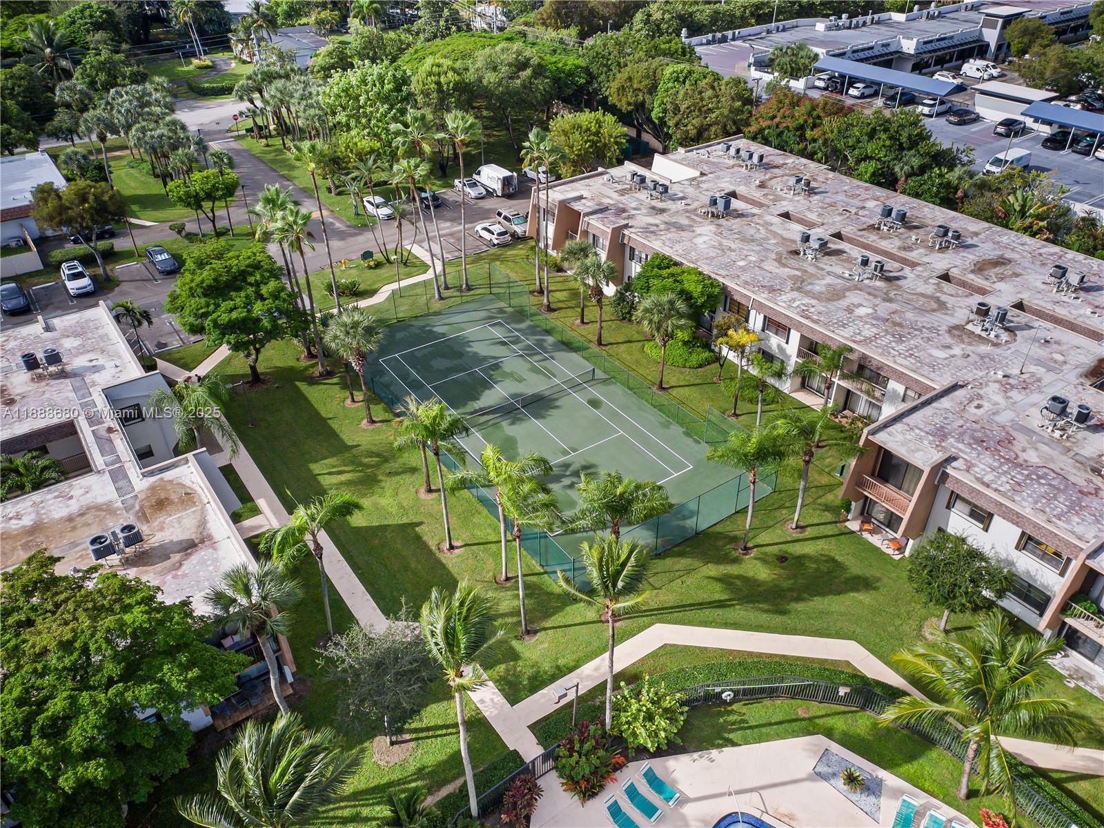 8277 Southwest 128th Street, Unit 108 Pinecrest, FL 33156 - Photo 30 of 34 an aerial view of residential houses with outdoor space