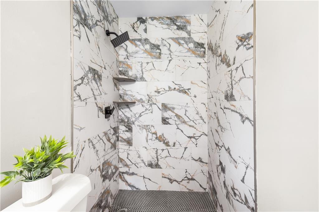 2773 Pasco Lane Southeast Atlanta, GA 30316 - Photo 17 of 40 a potted plant sitting on top of a wall