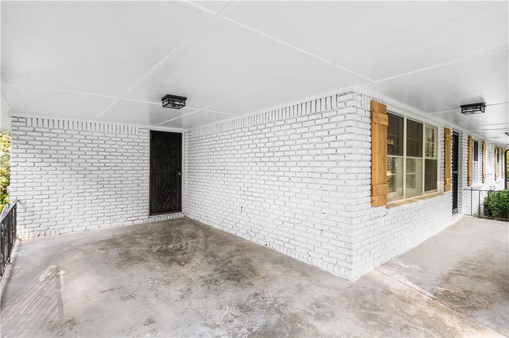 2773 Pasco Lane Southeast Atlanta, GA 30316 - Photo 2 of 40 a view of an empty room with windows