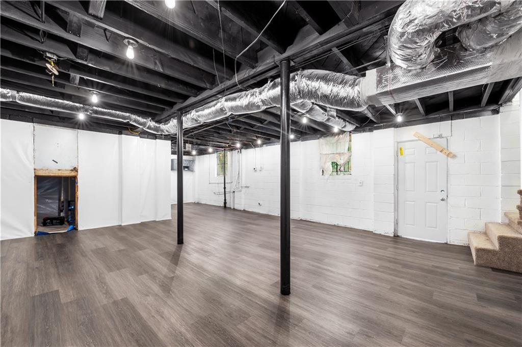 2773 Pasco Lane Southeast Atlanta, GA 30316 - Photo 23 of 40 a view of empty room with wooden floor