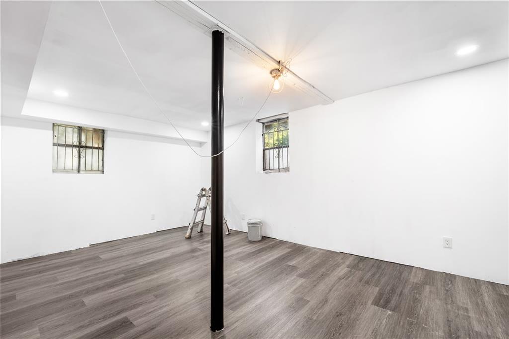 2773 Pasco Lane Southeast Atlanta, GA 30316 - Photo 26 of 40 a view of a hallway with wooden floor