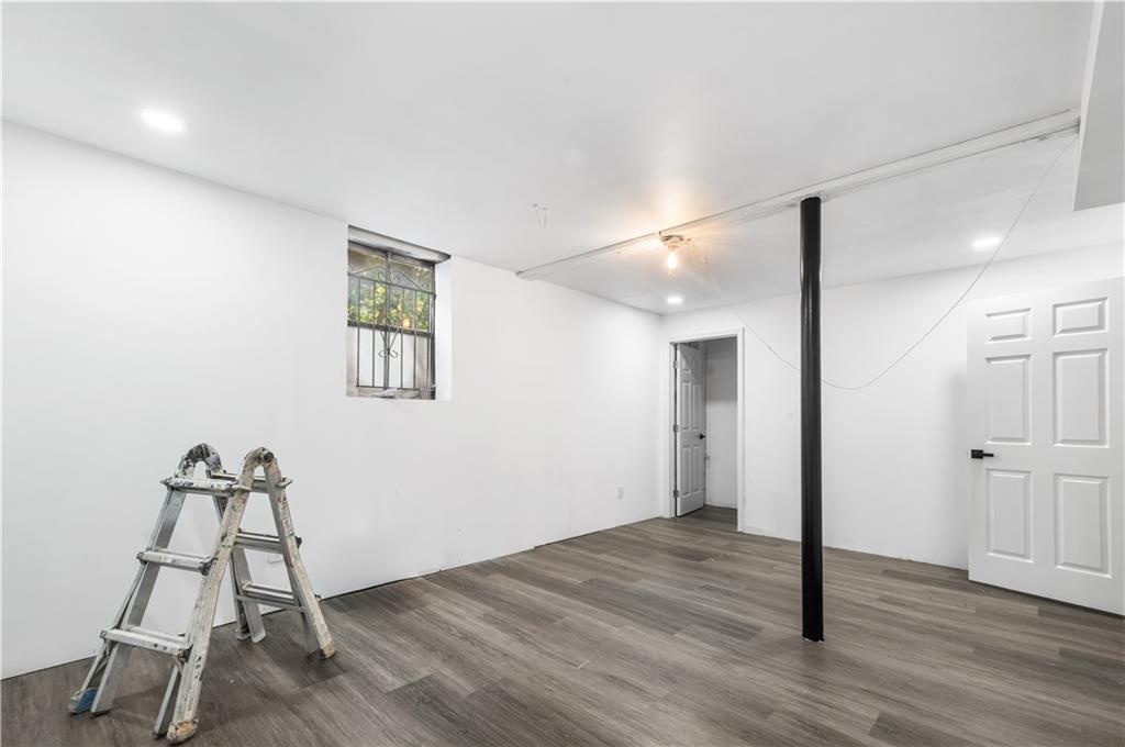 2773 Pasco Lane Southeast Atlanta, GA 30316 - Photo 27 of 40 a view of a room with wooden floor and windows