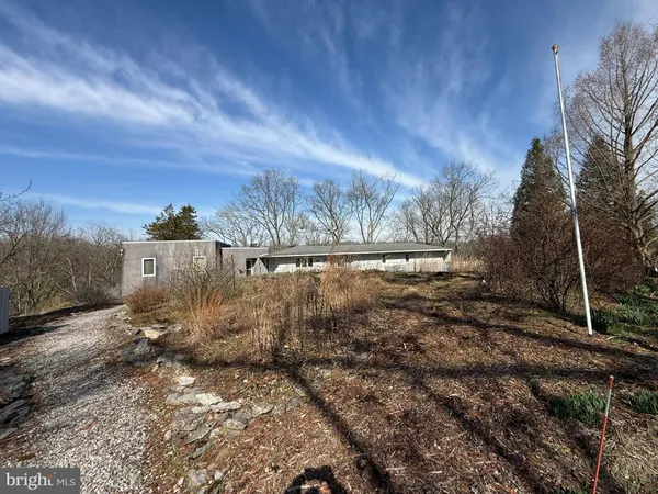 a aerial view of a house with a yard