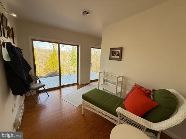 a bedroom with a bed and a view of bedroom