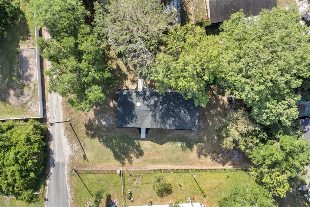 4793 Sunset Road St. Cloud, FL 34771 - Photo 22 of 28 a view of a yard with plants