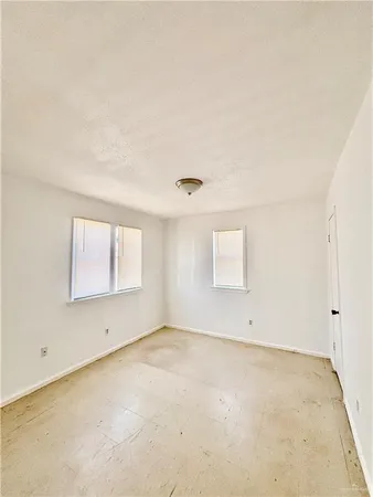 an empty room with a workbench