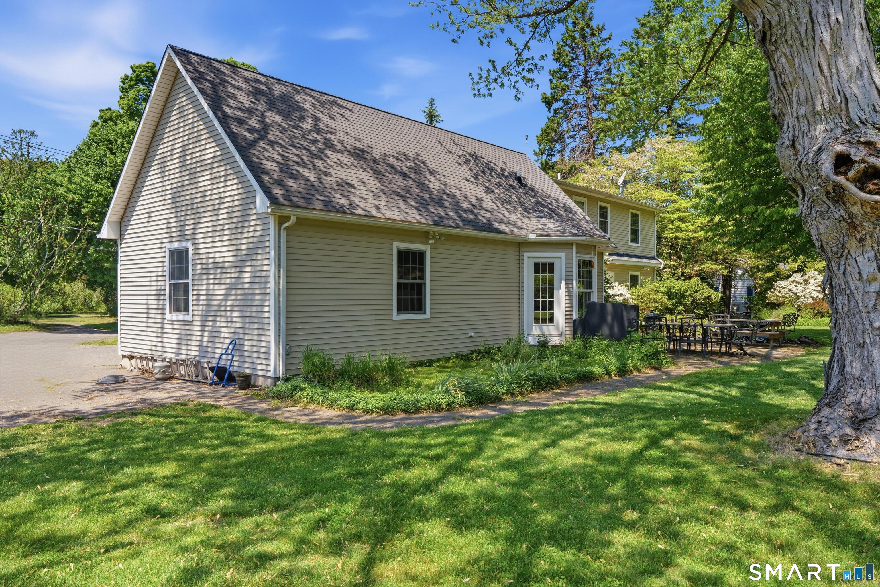 48 Case Road Burlington, CT 06013 - Photo 27 of 39 a view of a house with yard and green space