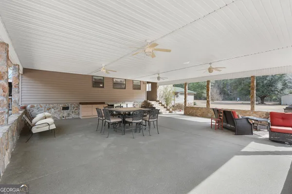 a view of backyard with tree