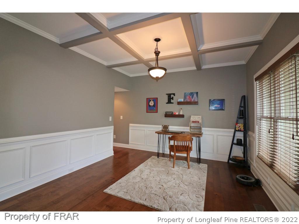 1187 Rays Bridge Road Whispering Pines, NC 28327 - Photo 27 of 35 a view of a workspace with furniture and a window