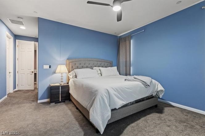 805 East Sunset Road Henderson, NV 89011 - Photo 22 of 43 Bedroom with carpet floors and ceiling fan