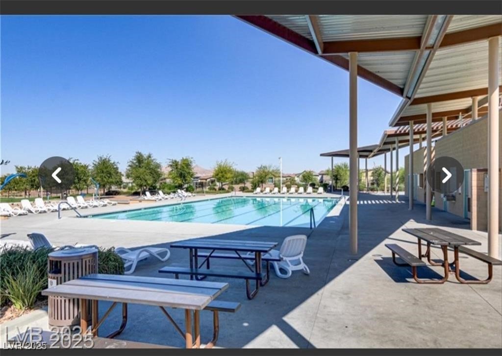 805 East Sunset Road Henderson, NV 89011 - Photo 33 of 43 Community pool featuring a patio area