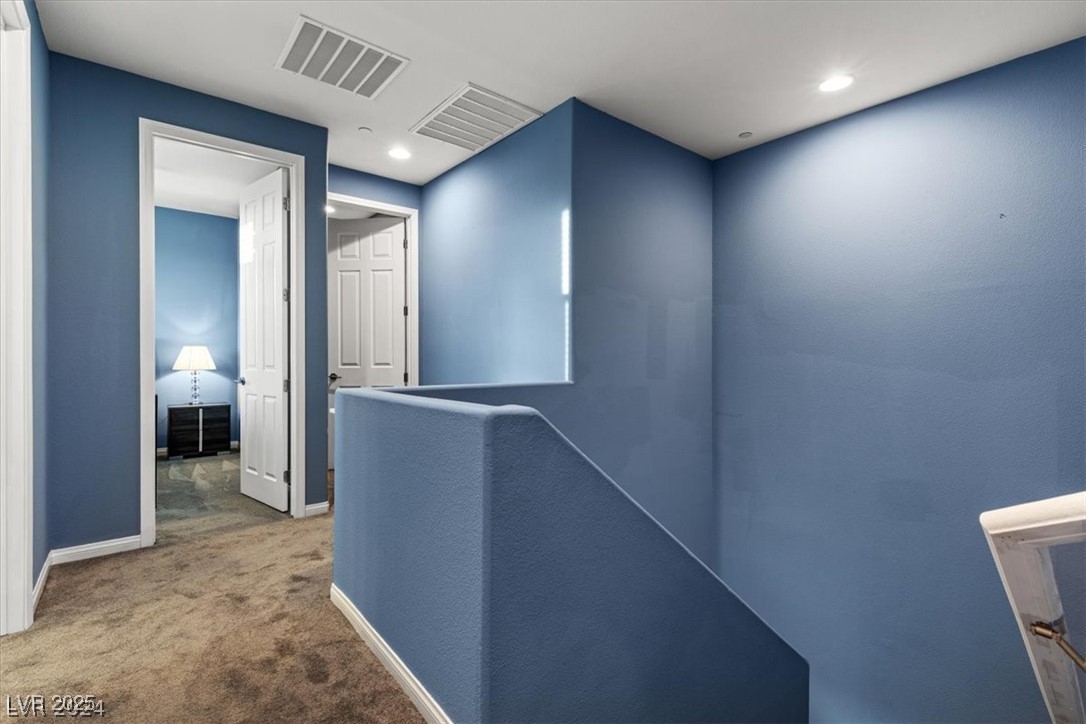 805 East Sunset Road Henderson, NV 89011 - Photo 4 of 43 Hall with an upstairs landing, carpet floors, and recessed lighting