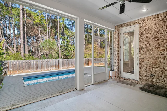 a view of balcony with wooden floor and outdoor space