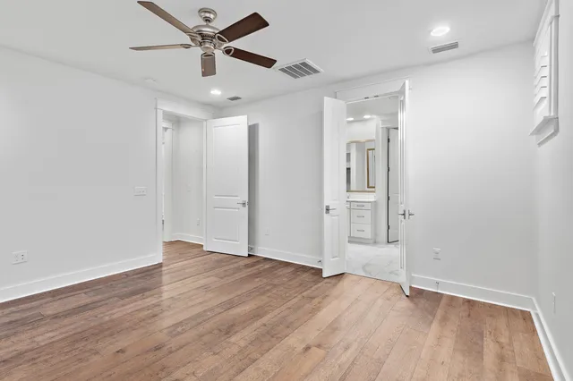 a bathroom with a shower sink and mirror