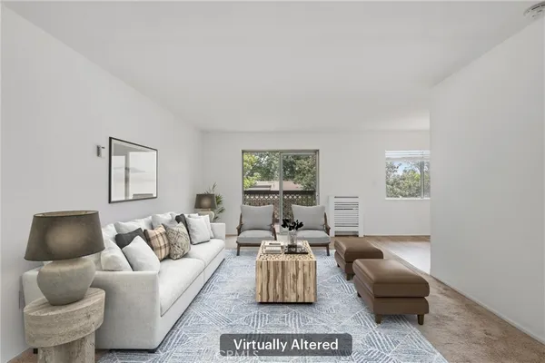 a living room with furniture and a couch