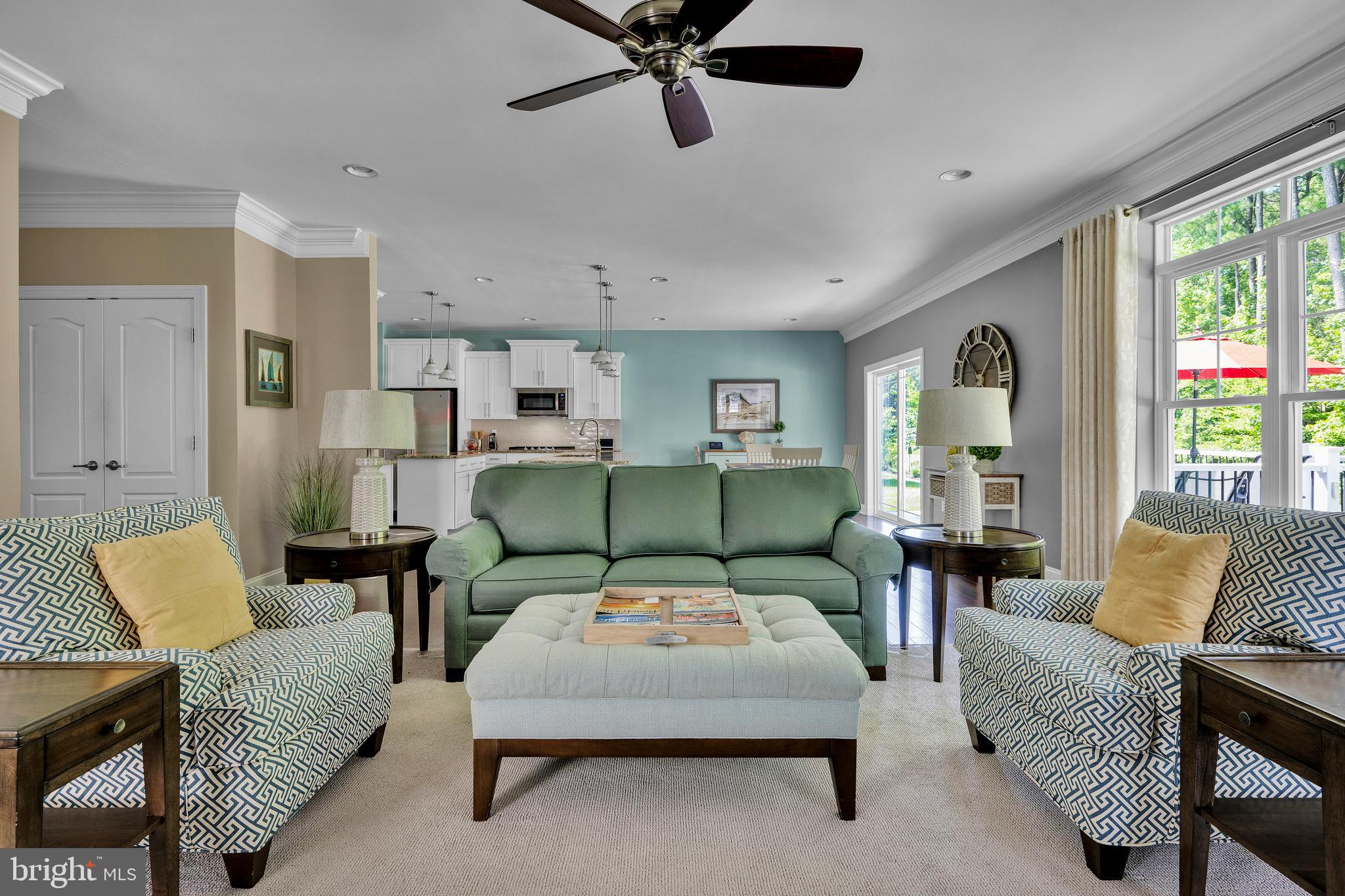 18131 Emerson Way Georgetown, DE 19947 - Photo 11 of 52 a living room with furniture and a large window