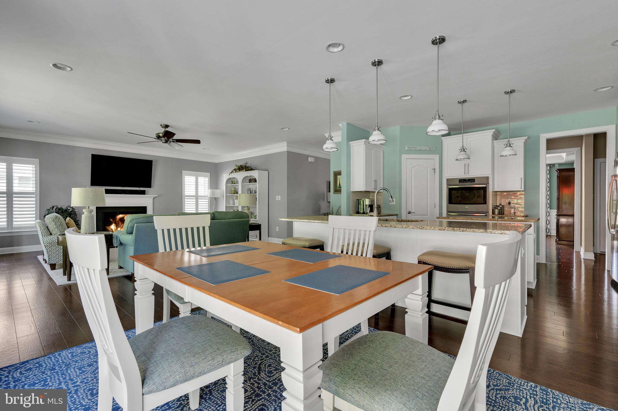 18131 Emerson Way Georgetown, DE 19947 - Photo 13 of 52 a outdoor space with furniture stove and wooden floor