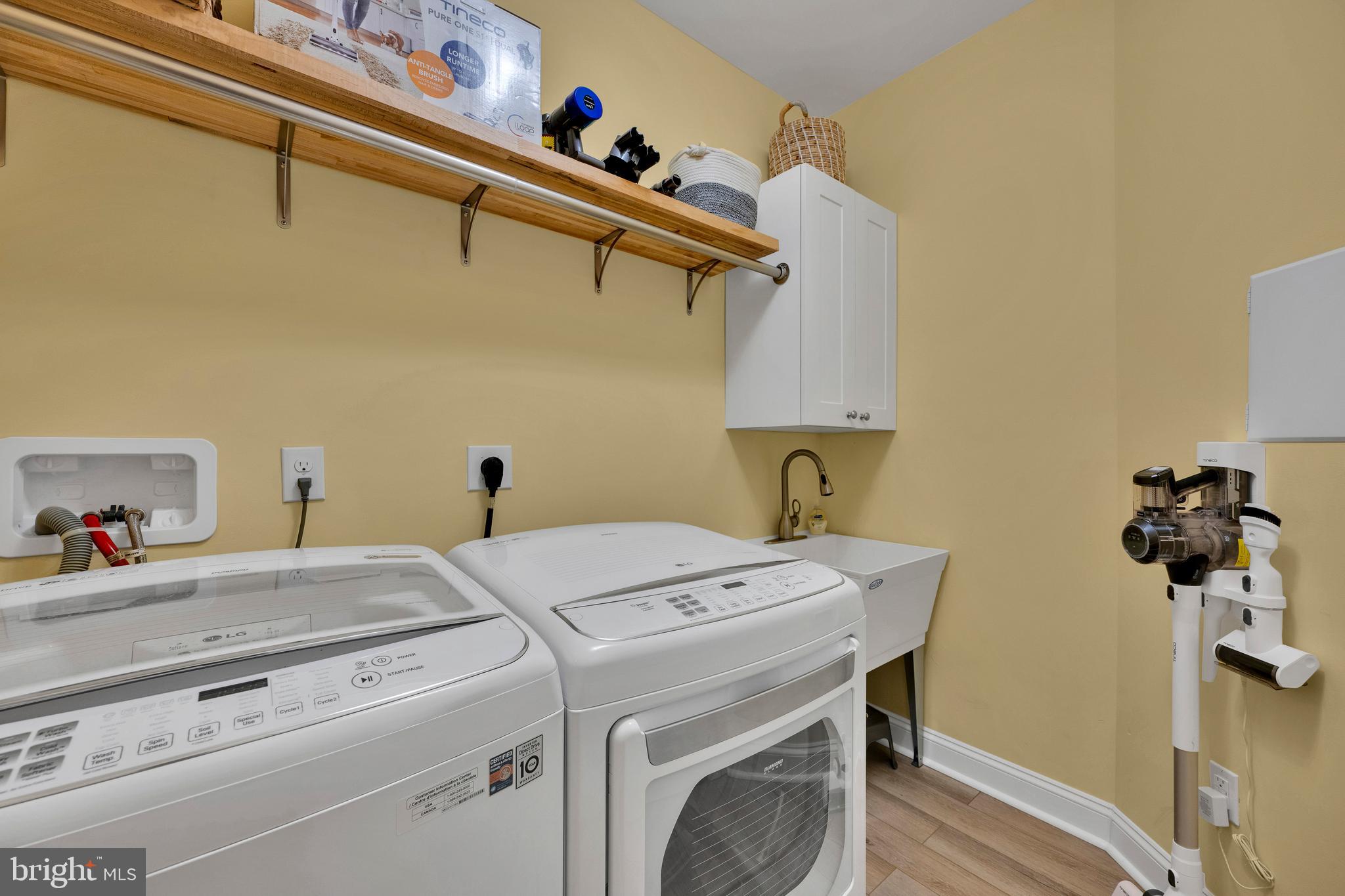 18131 Emerson Way Georgetown, DE 19947 - Photo 24 of 52 a utility room with dryer and washer