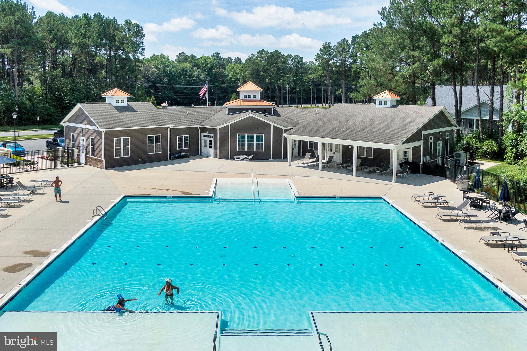 18131 Emerson Way Georgetown, DE 19947 - Photo 49 of 52 a aerial view of a house with swimming pool