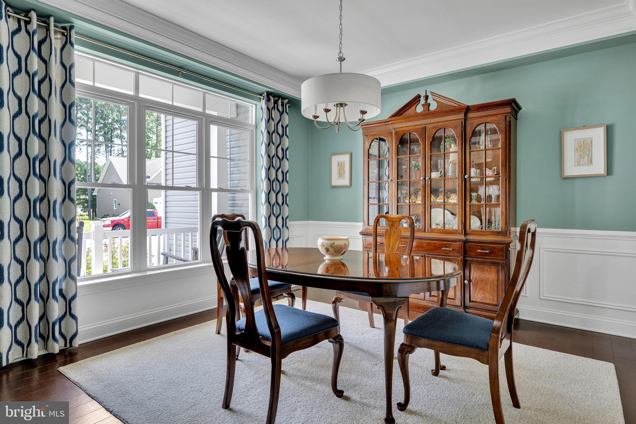 18131 Emerson Way Georgetown, DE 19947 - Photo 6 of 52 a view of a dining room with furniture window and outside view