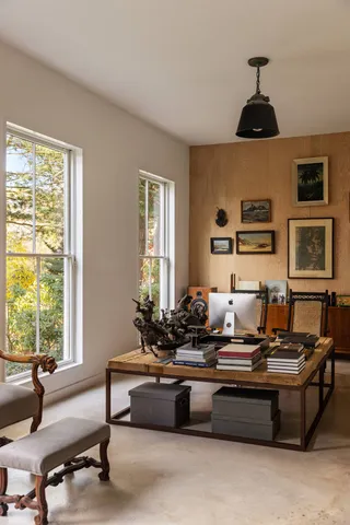 a living room with furniture and window
