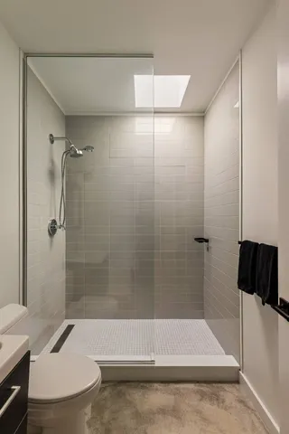 a bathroom with a bathtub and a shower