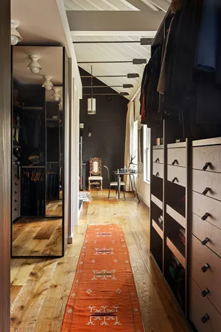 a swimming pool with table and chairs