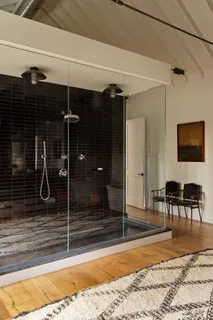 a view of a living room and bathroom