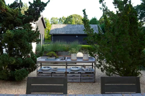 a view of a wooden deck and lake view