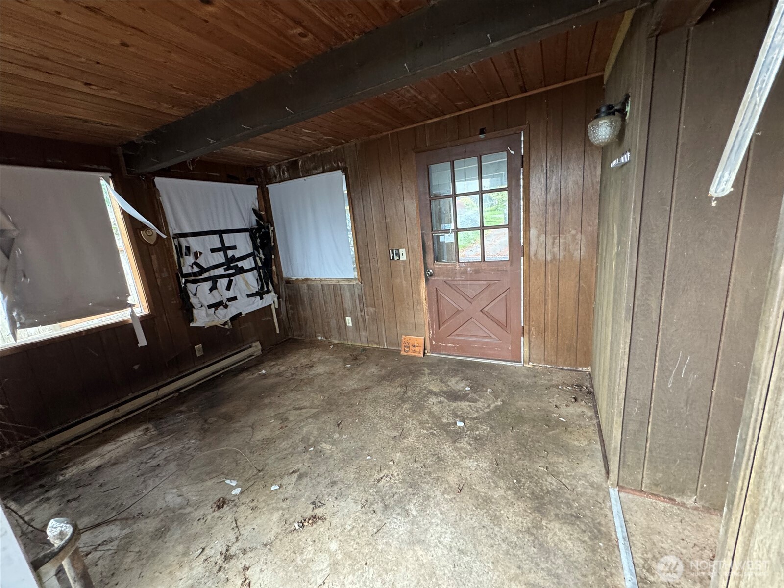 1284 Dines Point Road Greenbank, WA 98253 - Photo 14 of 39 a view of an empty room with windows