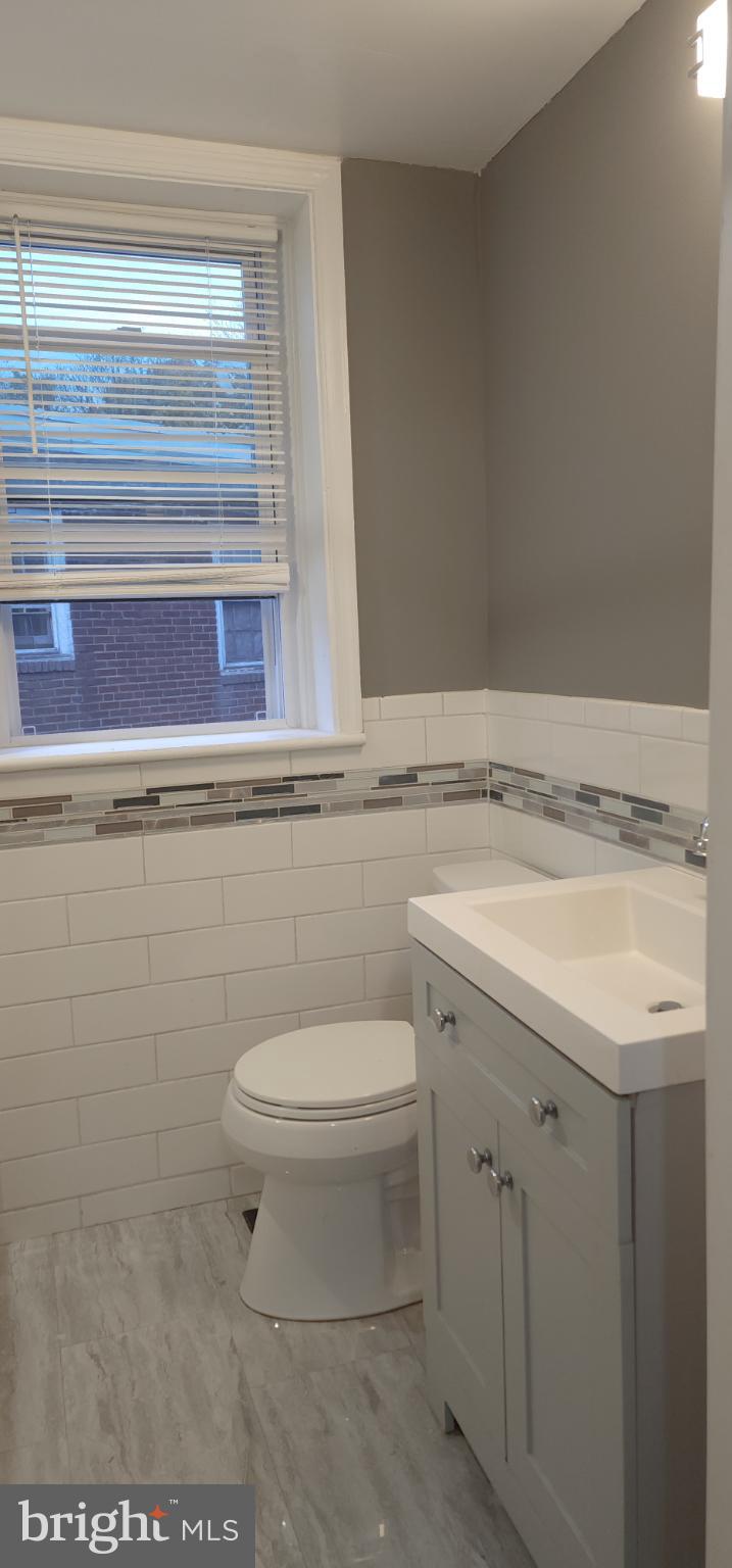 29 Concord Road Darby, PA 19023 - Photo 16 of 21 a bathroom with a sink and a toilet