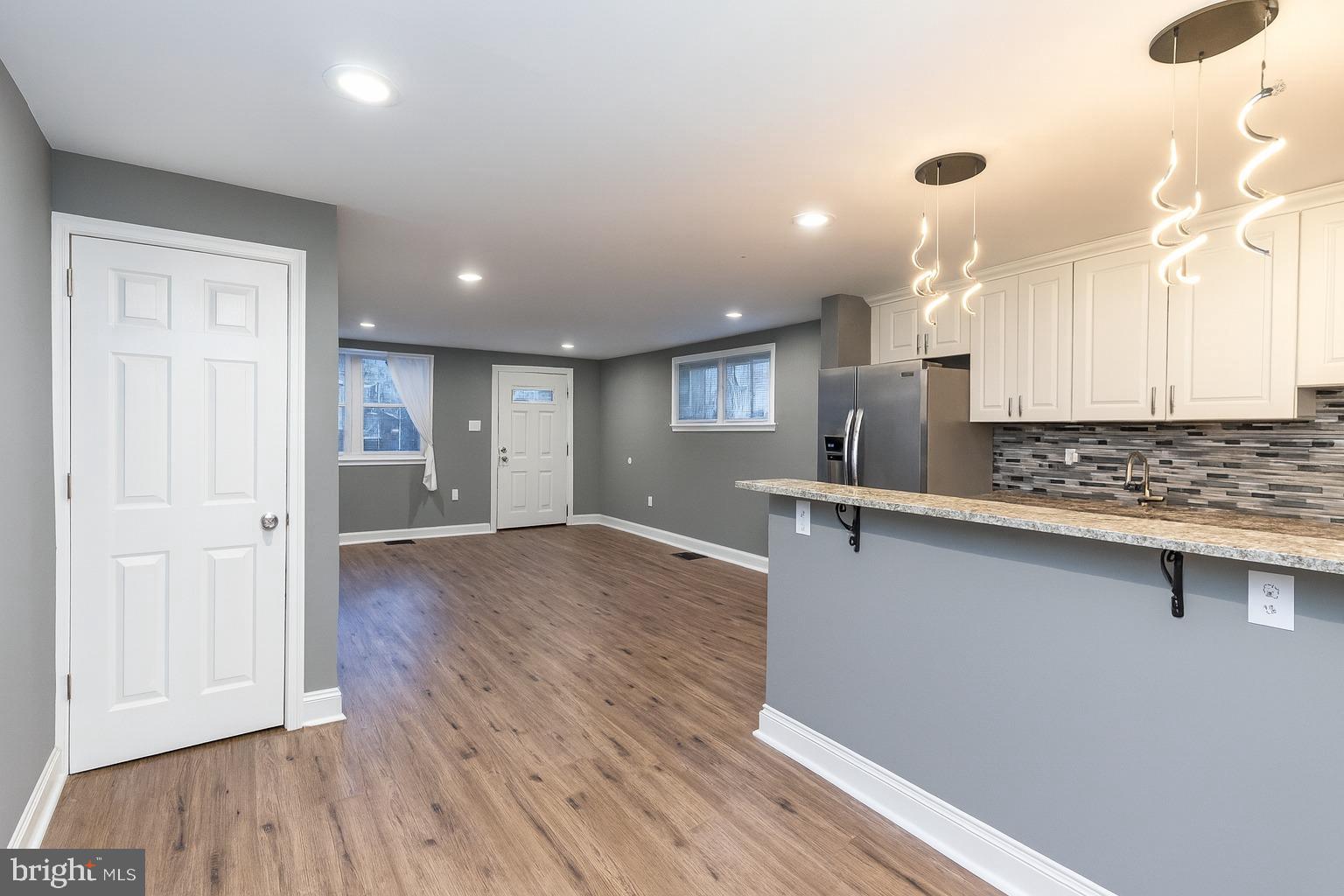 29 Concord Road Darby, PA 19023 - Photo 5 of 21 a view of a kitchen with a sink and wooden floor