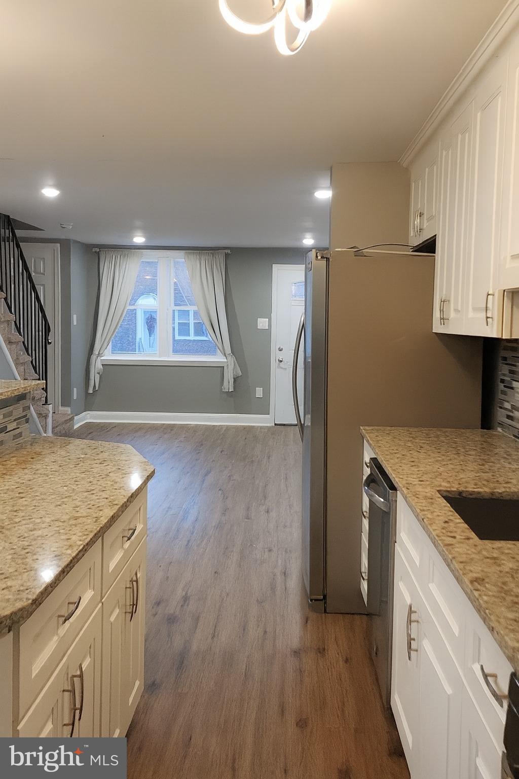 29 Concord Road Darby, PA 19023 - Photo 7 of 21 a kitchen with stainless steel appliances granite countertop a sink and a stove