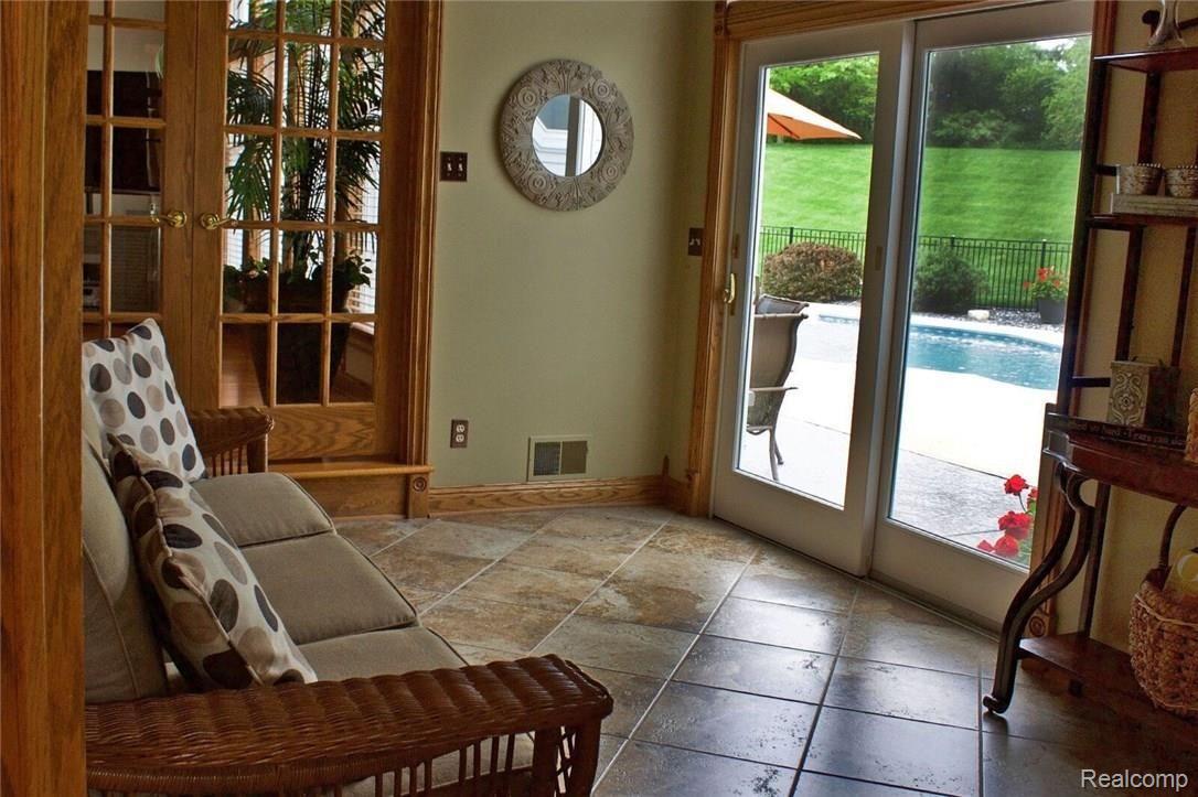 8096 Chilson Road Pinckney, MI 48169 - Photo 18 of 46 Sun Room with Pool View!