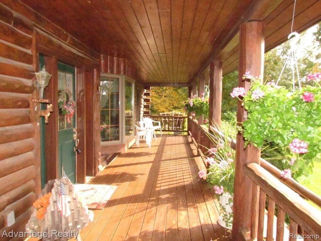 66538 Haven Ridge Road New Haven, MI 48050 - Photo 13 of 21 porch 1.JPG