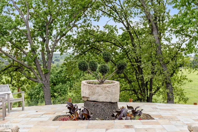 a view of a lake with a yard