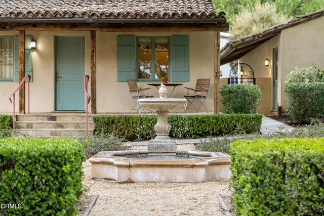 a view of a terrace with sitting area