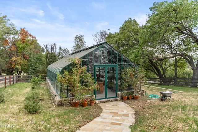 a view of entryway wooden floor and a yard