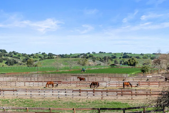a view of a golf course with a lake view