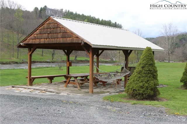 a view of backyard with green space