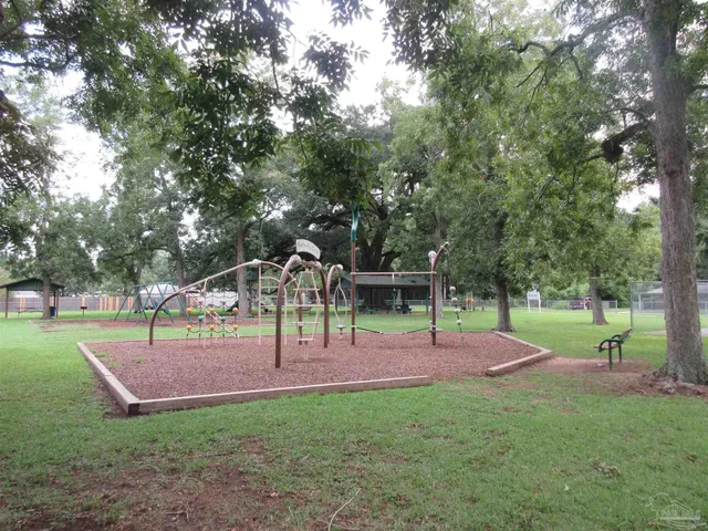 a view of park with swings