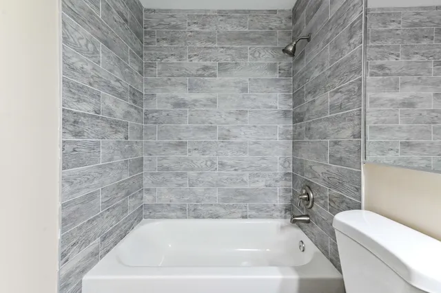 a bathroom with a bathtub