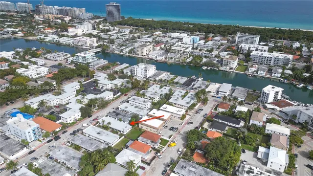 an aerial view of city and lake