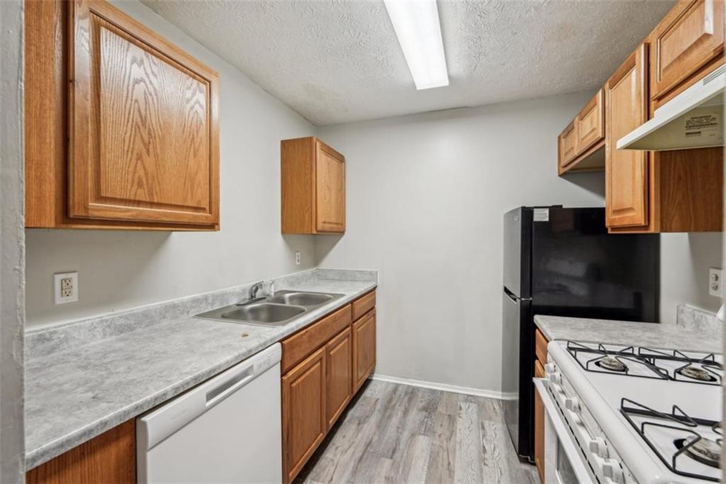 703 Pine Tree Trail Atlanta, GA 30349 - Photo 11 of 35