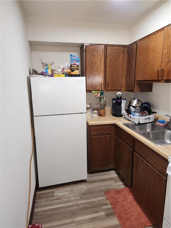 300 Helen Street McKees Rocks, PA 15136 - Photo 20 of 48 a kitchen with a sink a refrigerator and a stove