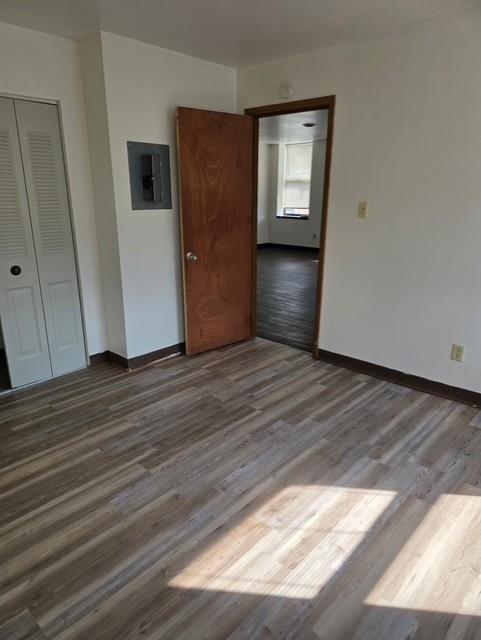 300 Helen Street McKees Rocks, PA 15136 - Photo 29 of 48 a view of an empty room with wooden floor and a window