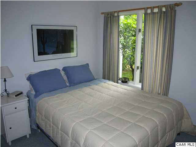 2864 Heartwood Road Afton, VA 22920 - Photo 14 of 21 a bedroom with a bed and a window
