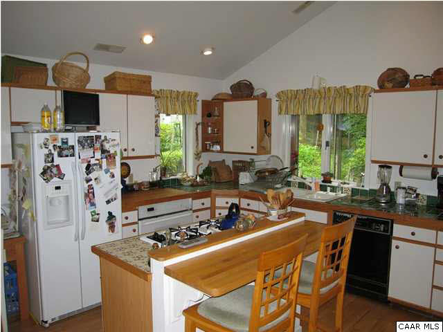 2864 Heartwood Road Afton, VA 22920 - Photo 6 of 21 a kitchen with stainless steel appliances a stove a sink dishwasher and a refrigerator